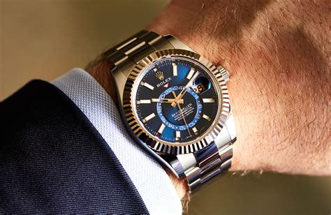 blue face rolex sky dweller.